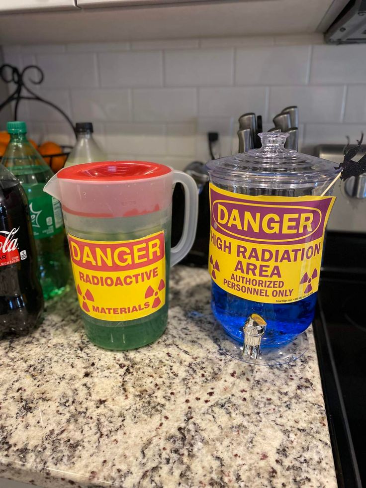 there are two cups on the counter next to each other, one with danger high radiation tea