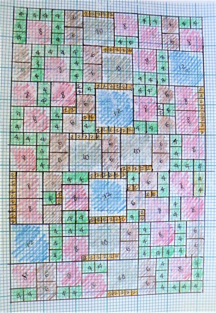 a drawing of a game board with numbers and squares drawn on the paper in different colors