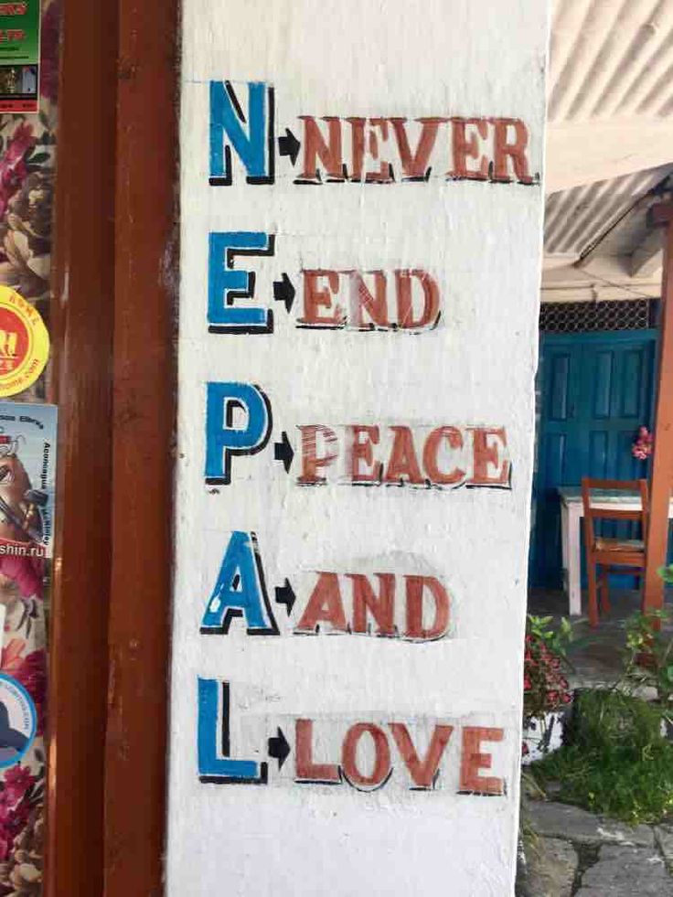 a sign that says never end peace and love
