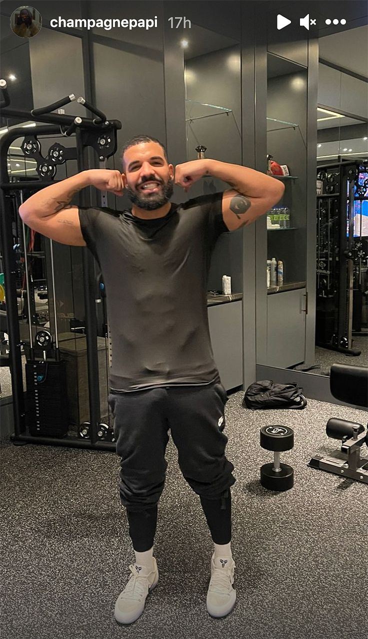 a man standing in front of a gym machine