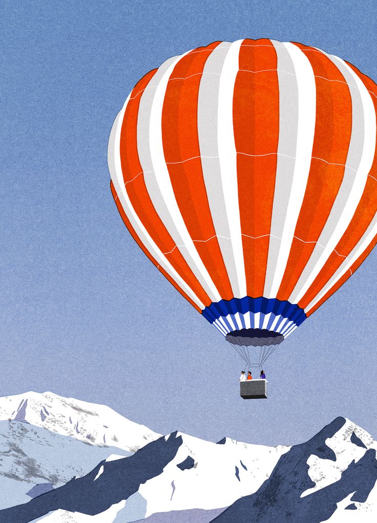 an orange and white striped hot air balloon flying over the snow covered mountain range with mountains in the background