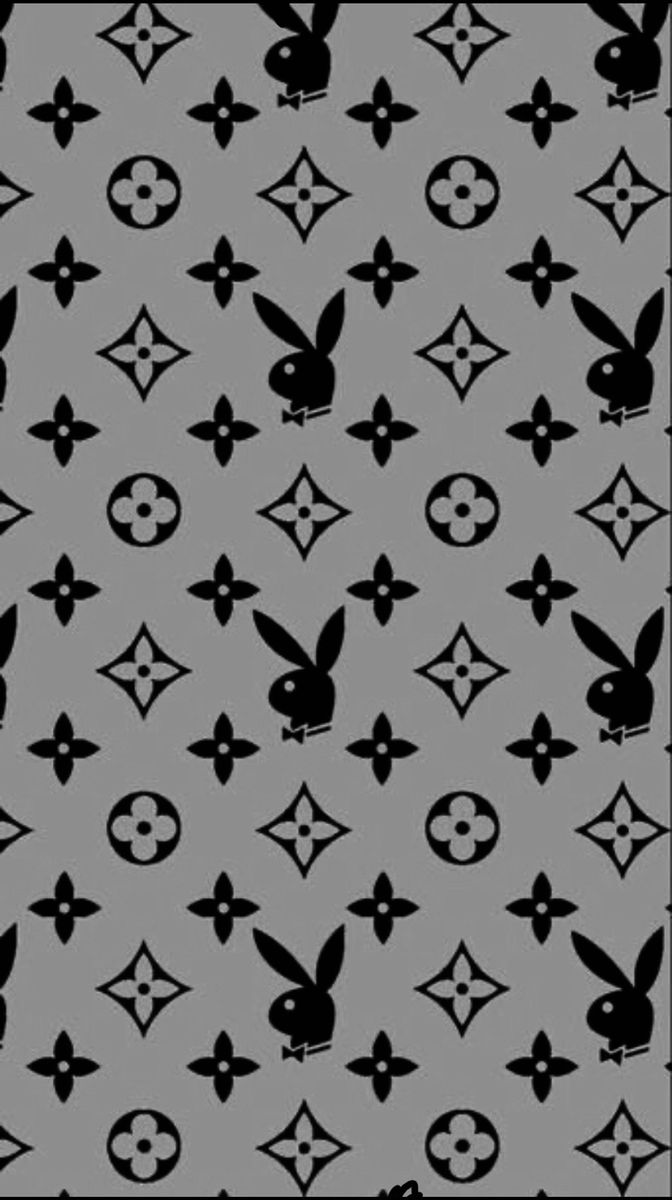 a black and white pattern with rabbits on it