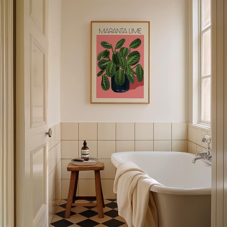 a bathroom with a bathtub and a painting on the wall