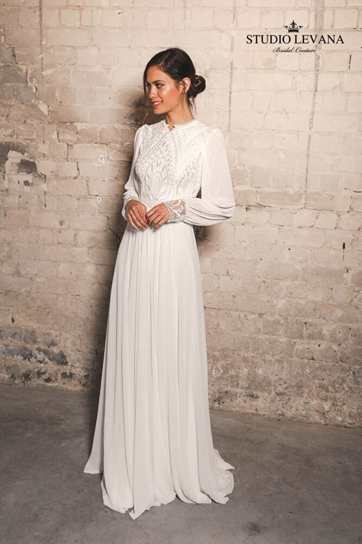 High Neck Simple Elegant Modest Wedding Dress with Long Sleeves For Modern Brides Boho Modest Wedding Dress Long Sleeve, Modest Flowy Wedding Dress, Wedding Modest Dresses, Modest Bride Dress, Modest Engagement Dress, Modest Boho Wedding Dress, Elegant Modest Wedding Dresses, Wedding Dresses Flowy Sleeves, Simple Engagement Dress