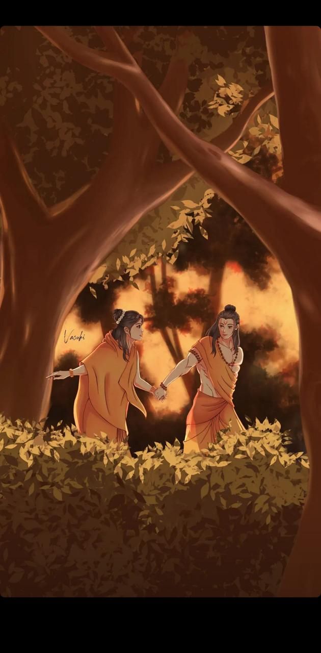 two people holding hands under a tree in the woods with leaves all around them and one person wearing an orange outfit