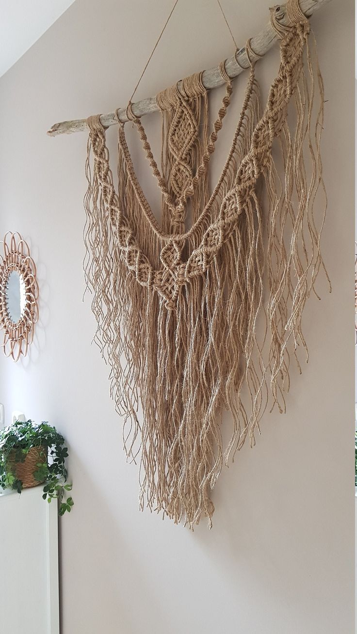 there is a wall hanging made out of rope