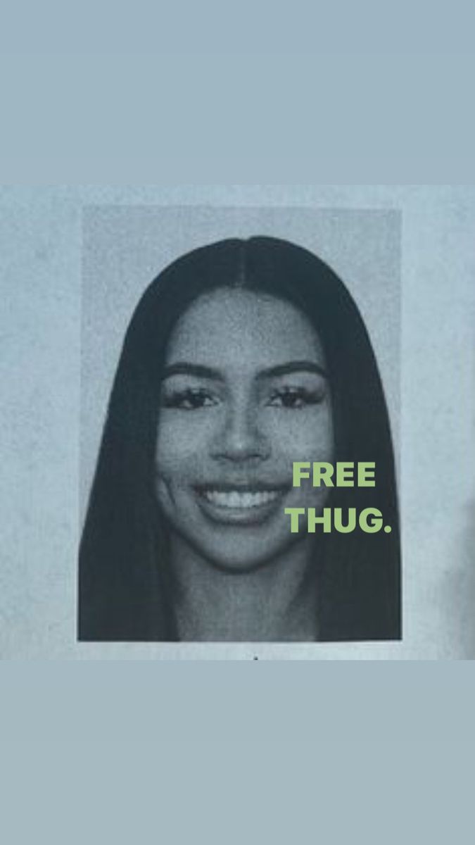 a woman's face with the words free thug on it and an image of a smiling woman