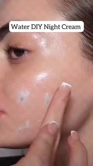 a woman with her hand on her face and the words water diy night cream