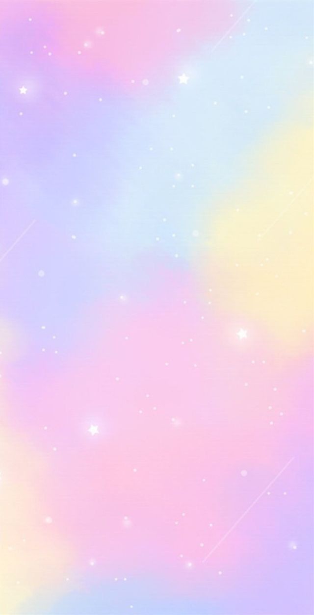 the sky is very pink and blue with white stars on it's sides, as well as pastel colors