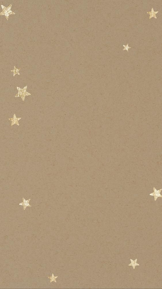 a brown background with gold stars on it