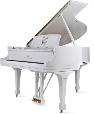 a white grand piano with a man playing on the top and bottom part, in front of a white background