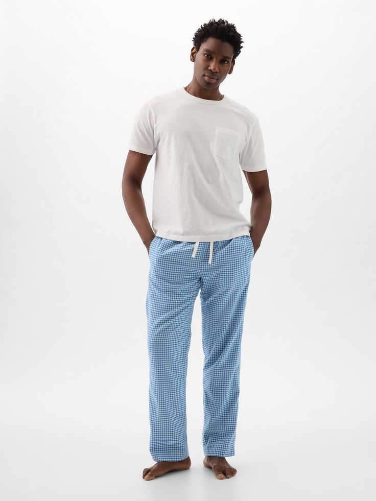 Soft, lightweight cotton flannel pajama pants.  Elasticized waist with drawcords.  Front slant pockets.  Certain styles have allover prints.  * Fit: Relaxed.  An easy silhouette throughout.  Models are 6′1″–6′2″ 185 cm–188 cm) with a 31″ 79 cm) waist & 32–33″ 81 cm–84 cm) inseam & are wearing Gap Flannel Pj Pants, Easy Silhouette, Flannel Pajama Pants, Flannel Pajamas, Pj Pants, Pants Blue, Blue Gingham, Cotton Flannel, Blue Stripes