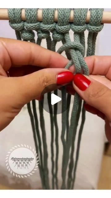 someone crocheting the ends of two yarns together to make a flower vase