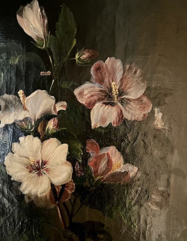 a painting of flowers in a vase on a table