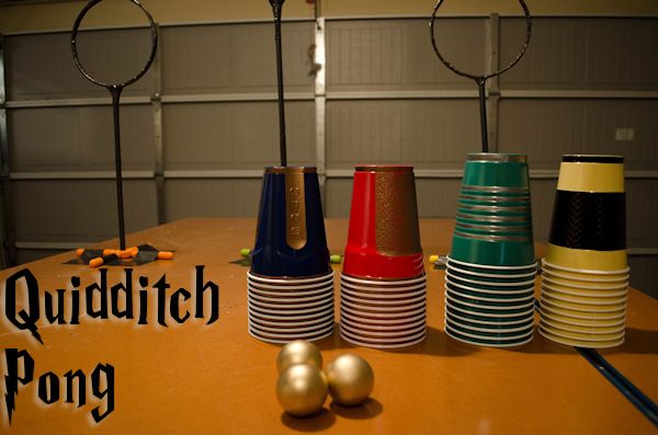 there are many different colored cups on the table