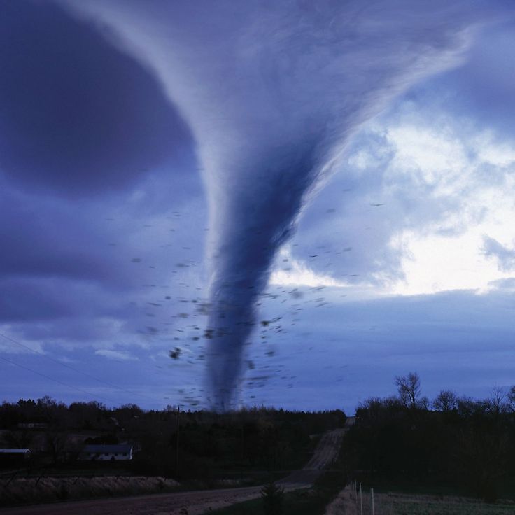 a very large tornado is in the sky