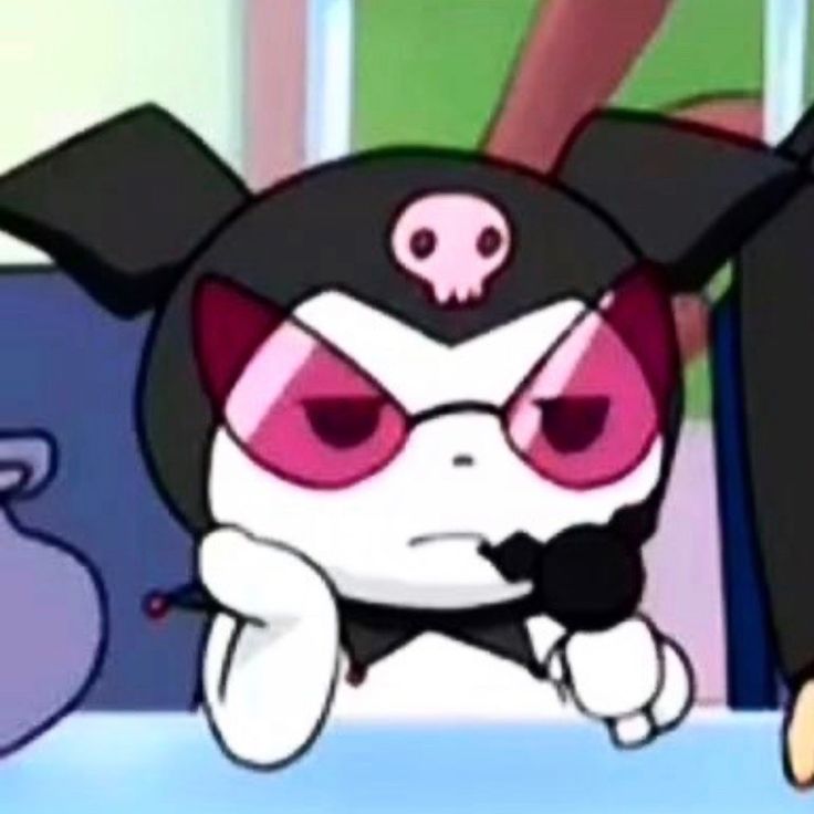 a cartoon character with red eyes and a skull on his head sitting at a table