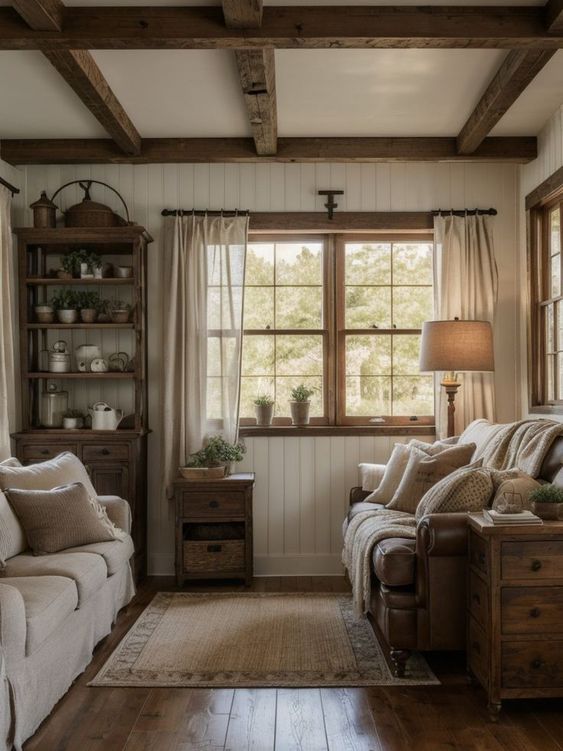 a living room filled with furniture and windows