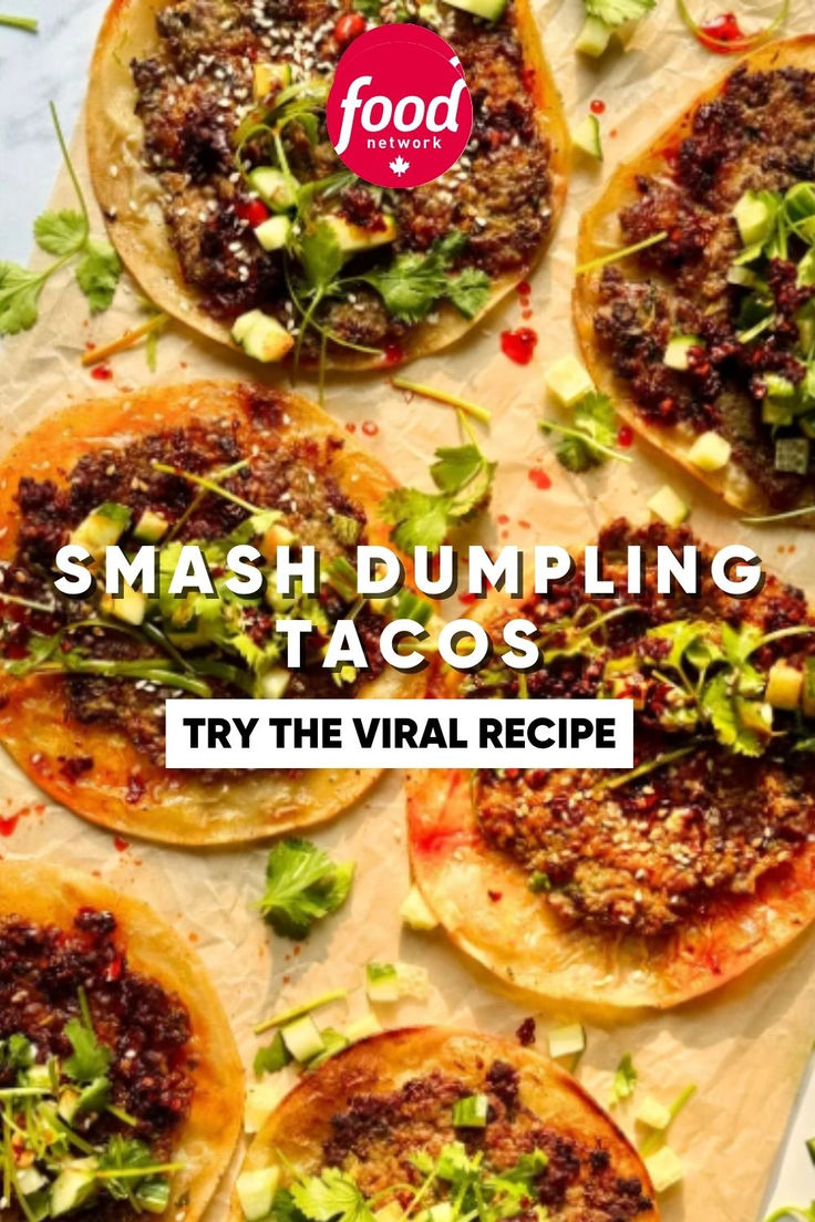 some tacos that are sitting on top of a wooden board with the words smash dumpling tacos