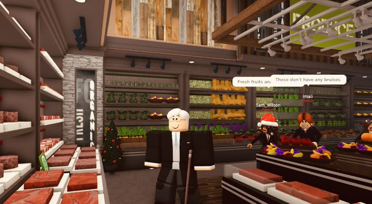 a cartoon character standing in front of a store filled with christmas decorations and candy bars