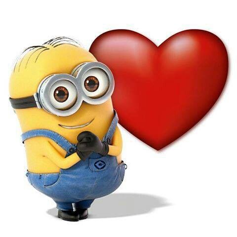 a minion is holding a camera in front of a heart with the words roberto on it