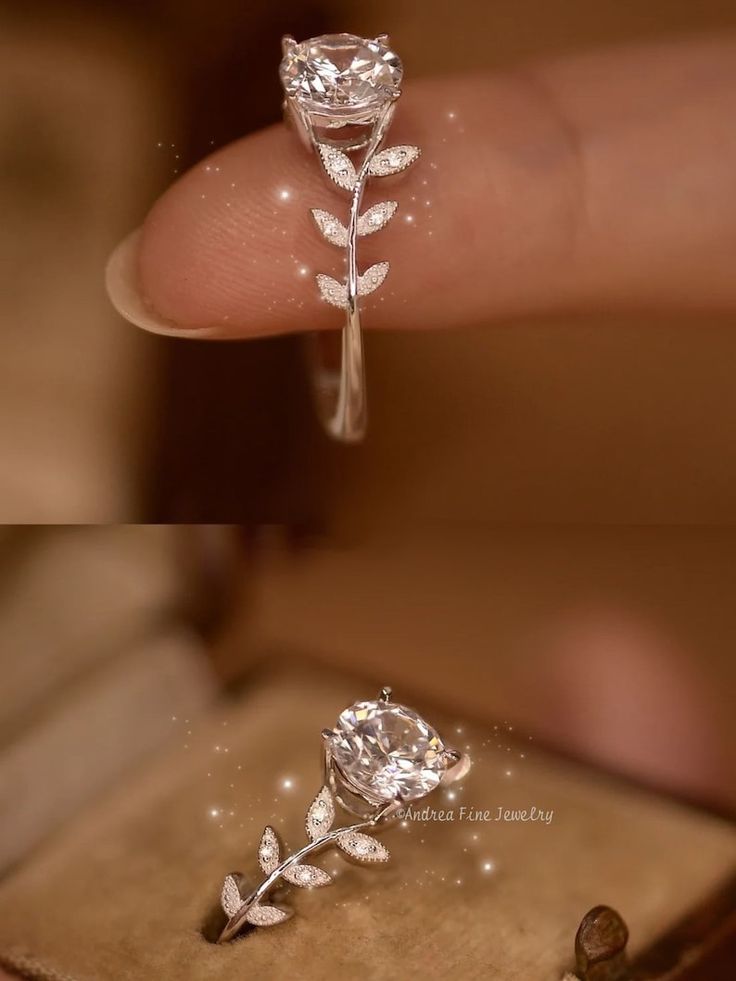 a close up of a person holding a diamond ring