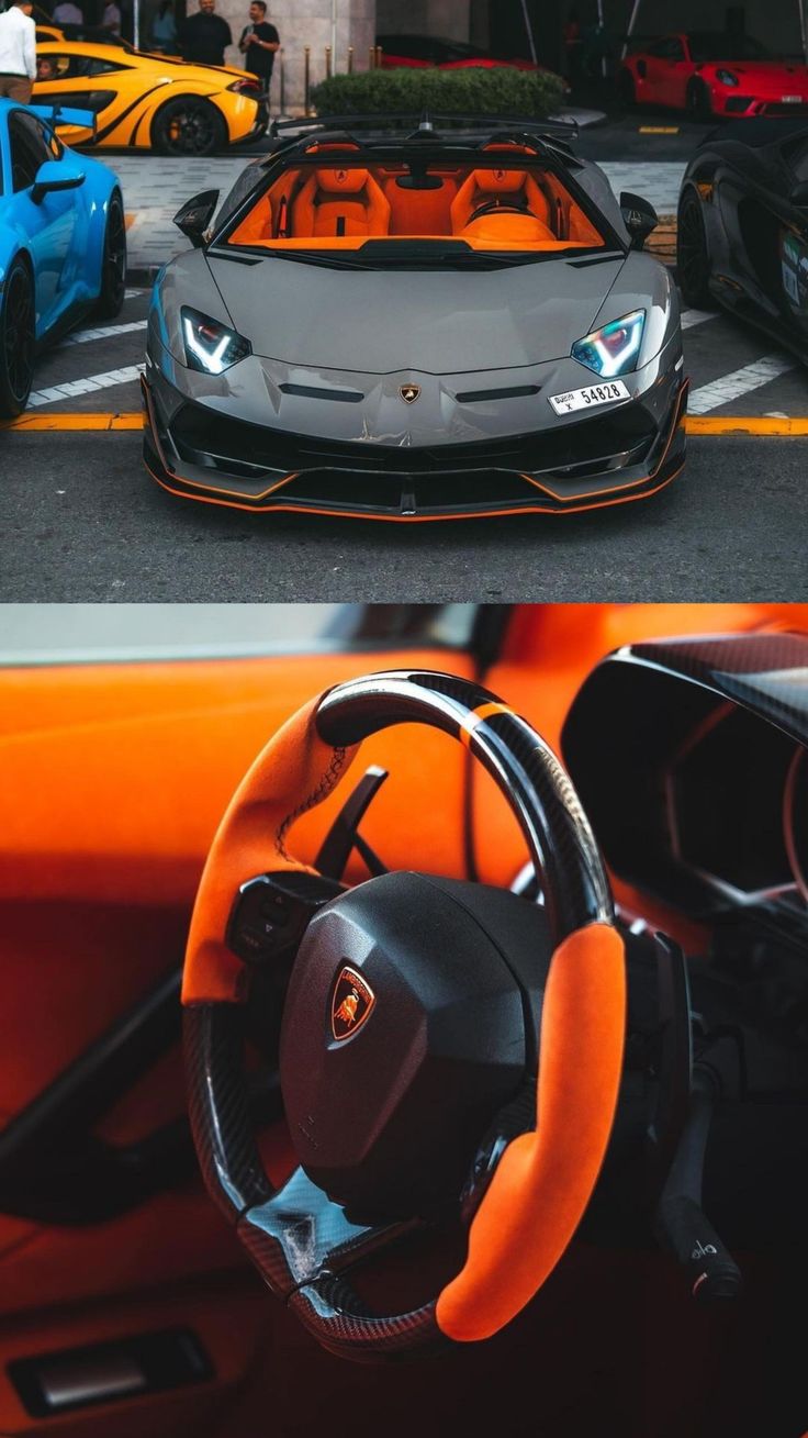 an orange and black sports car is parked in front of another one with the steering wheel down