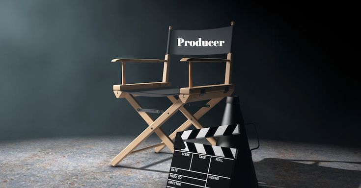 a director's chair sitting next to a movie clapper