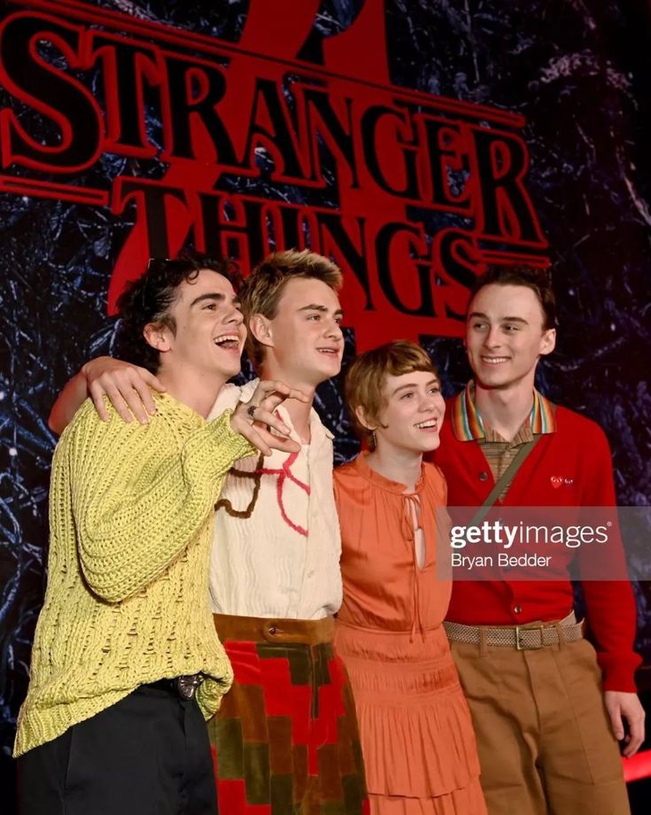 the cast of'strange things'poses for a photo on stage at an event