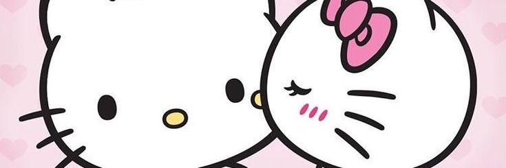 an image of two hello kitty characters hugging each other