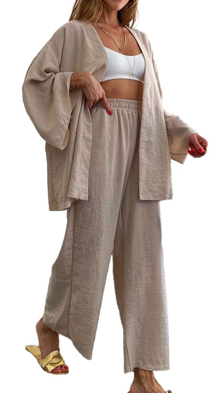 PRICES MAY VARY. POLYESTER Imported open style closure Machine Wash Fashionable 2 Piece loung Set - This women's casual outfit includes a solid color loose long sleeve cardigan and high waisted loose elastic pants with pockets. It's made from a blend of polyester, ensuring both comfort and durability. Solid Color Design - The outfit comes in a solid color design, making it easy to match with other pieces of clothing and accessories. The loose and relaxed fit of both the cardigan and pants provid Pants Sets Two Piece, Loose On Loose Outfit, Long Beach Outfit, Summer Outfit Pants Casual, Loose Pants Women Outfit, Beach Outfit Long Sleeve, Loose Pants Summer Outfit, Long Sleeved Summer Outfits, Summer Lounge Wear Outfits