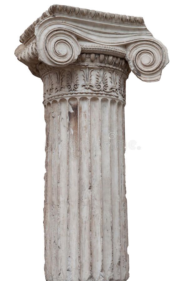 an old, weathered column with decorative designs on the top and bottom part is shown