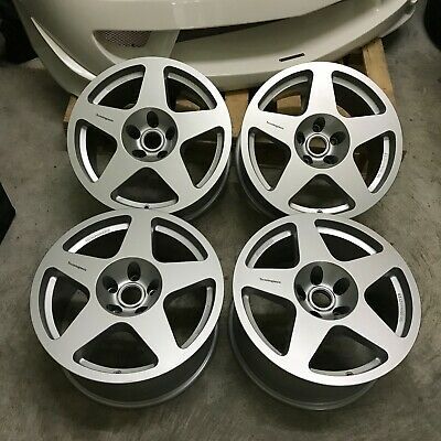 four new 18x8 5 spokes wheels for the ford mustang, all in good condition