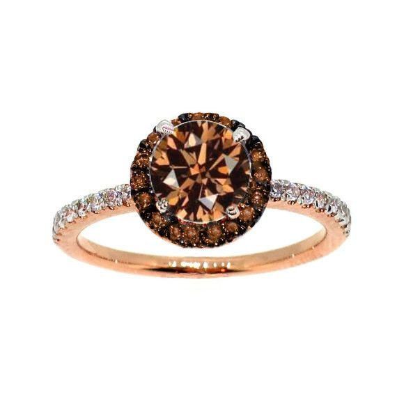 a brown and white diamond ring