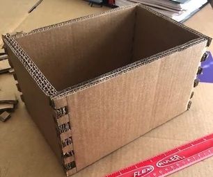 Box Jointed Cardboard Box Cardboard Box Nightstand Diy, How To Make Box Out Of Cardboard, How To Make A Small Box Out Of Cardboard, Cardboard Box Organization Diy, Cardboard Box Upcycle, Painting Cardboard Boxes, Diy Box Storage, Cardboard Box Storage, Cardboard Furniture Design