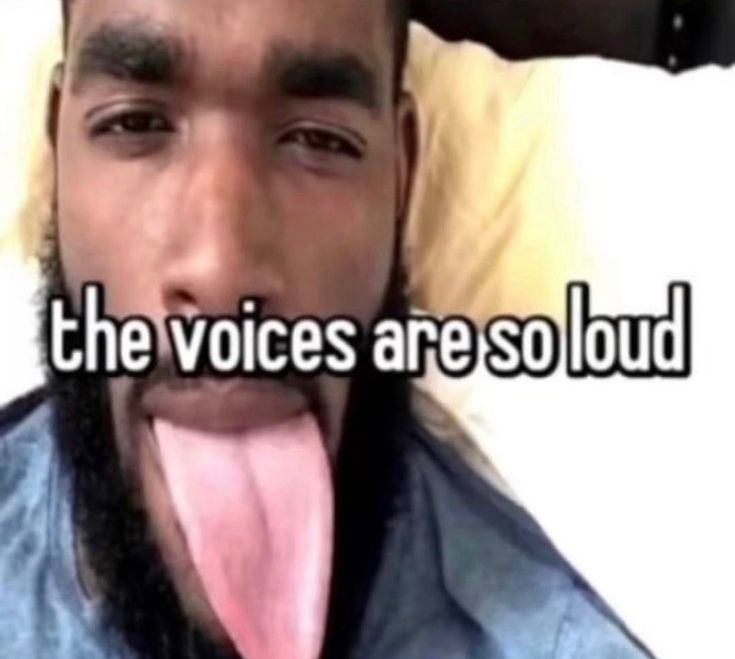 a man sticking his tongue out with the words'the voice are so loud'in front of him