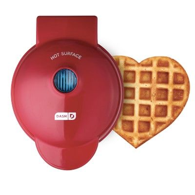 a waffle maker with a heart shaped cutout