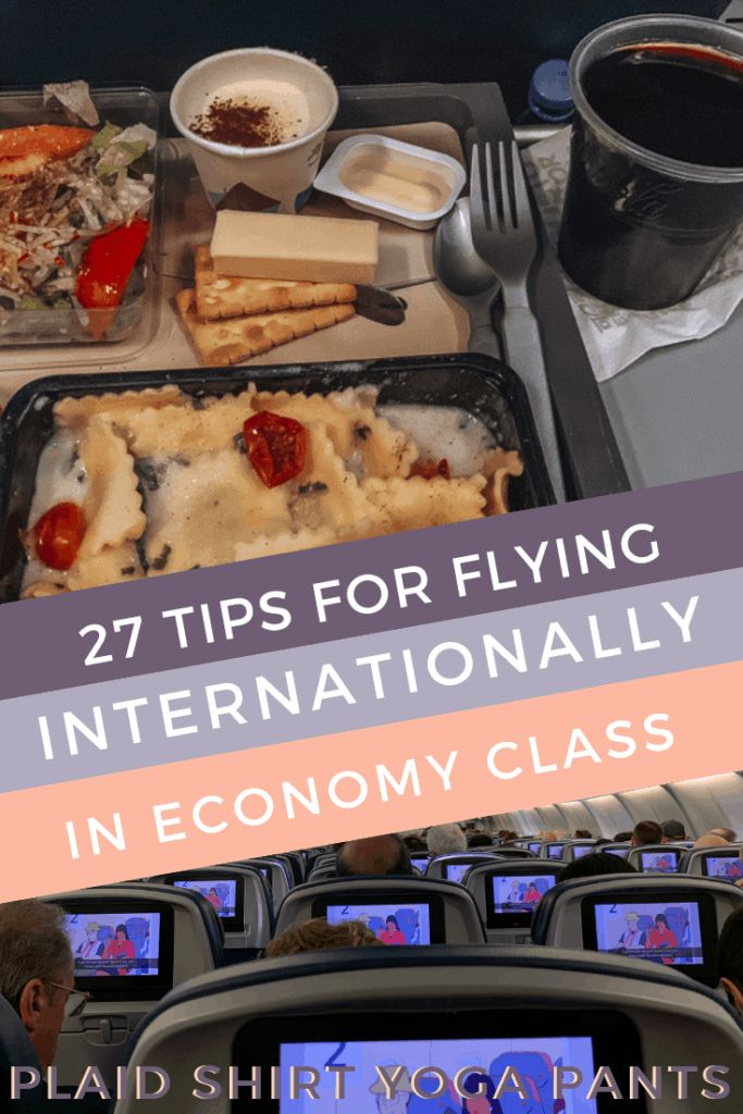 an airplane tray with food and drinks on it that says, 27 tips for flying internationally in economy class
