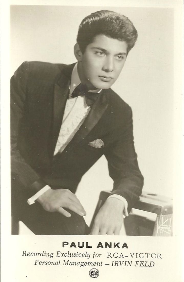 an old photo of a man in a tuxedo