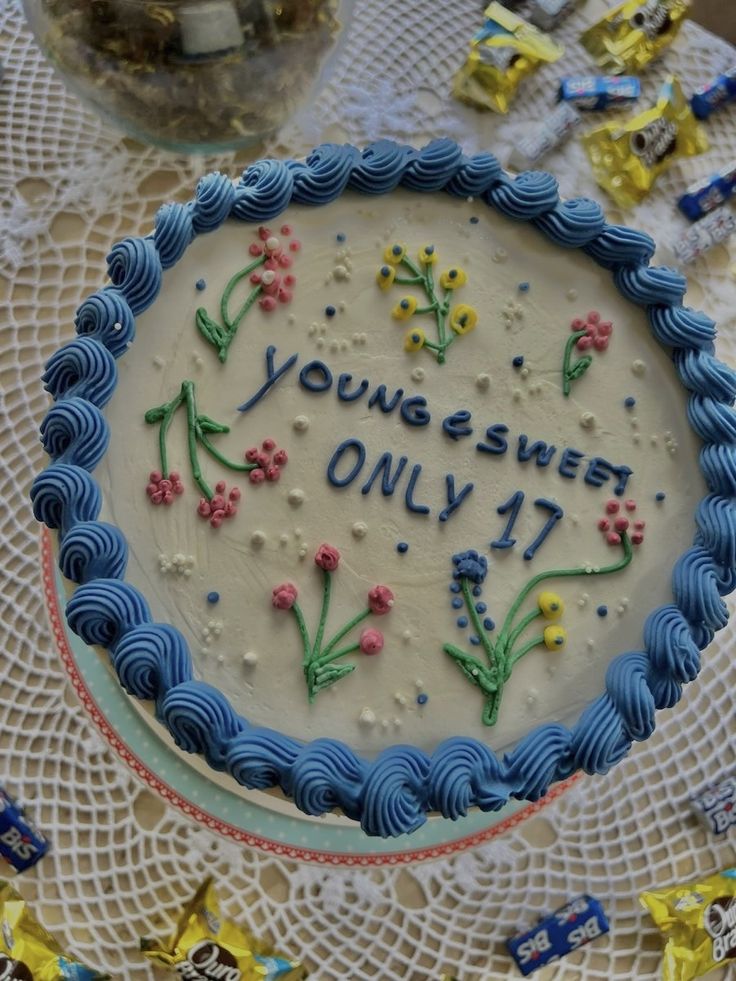 a blue and white cake with the words you're sweet only 17 on it