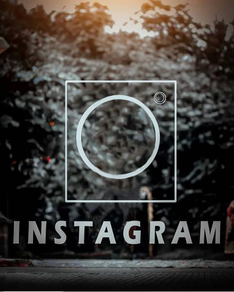 the instagram logo is shown in front of some trees and people standing around it