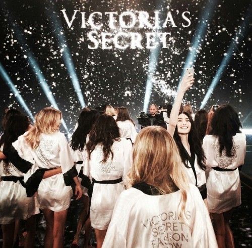 the victoria's secret models are all dressed in white outfits and confetti