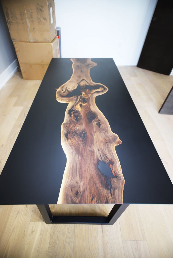 the table is made out of wood and has a unique design on it's surface