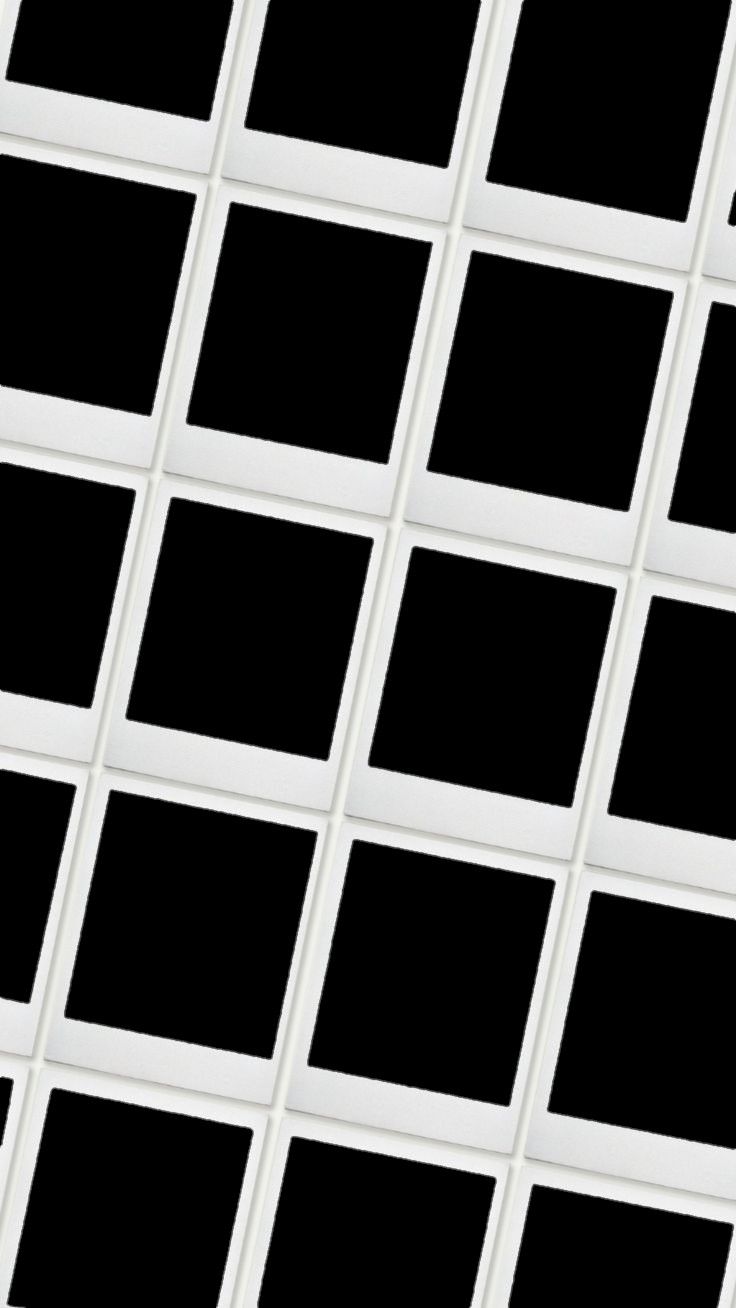 black and white squares are arranged in the shape of rectangles on a wall