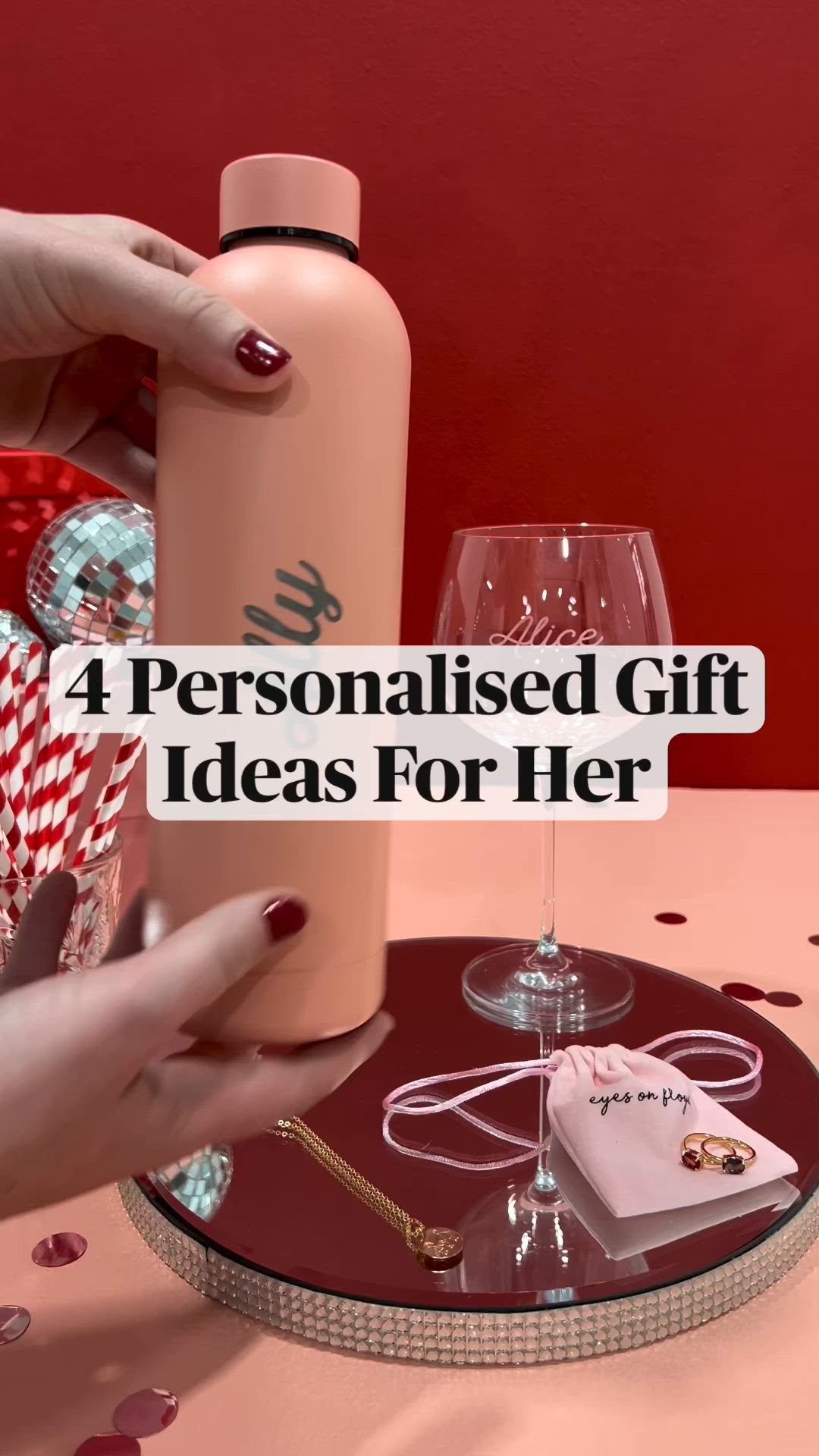 This may contain: a woman is holding a pink bottle with the words, personalised gift ideas for her