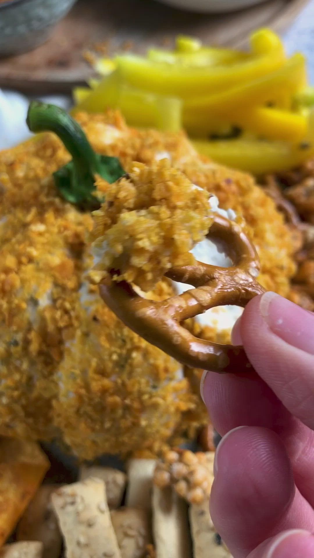 This may contain: an assortment of food on a plate with crackers and other foods in the background