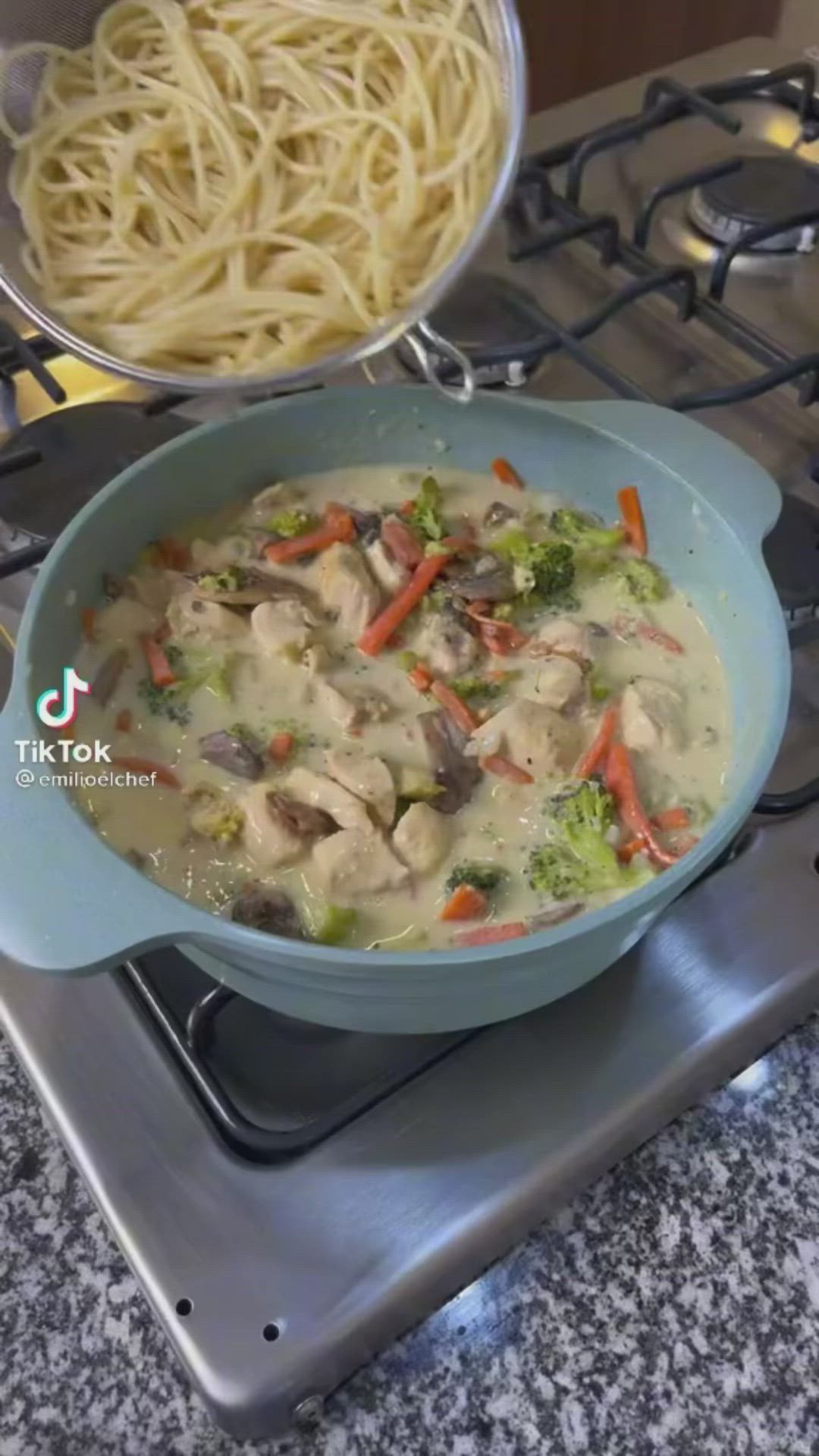 This may contain: two pans filled with food sitting on top of a stove next to each other