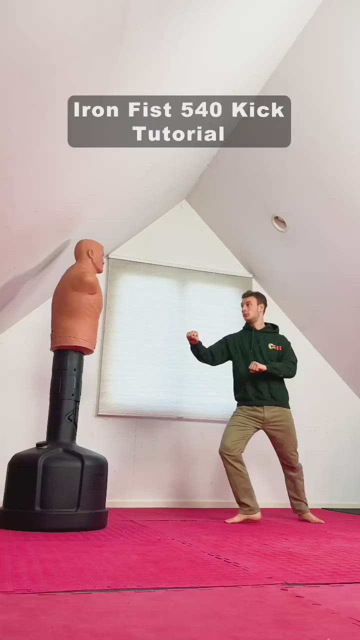 This may contain: a man standing in front of a projector screen next to a fake human head