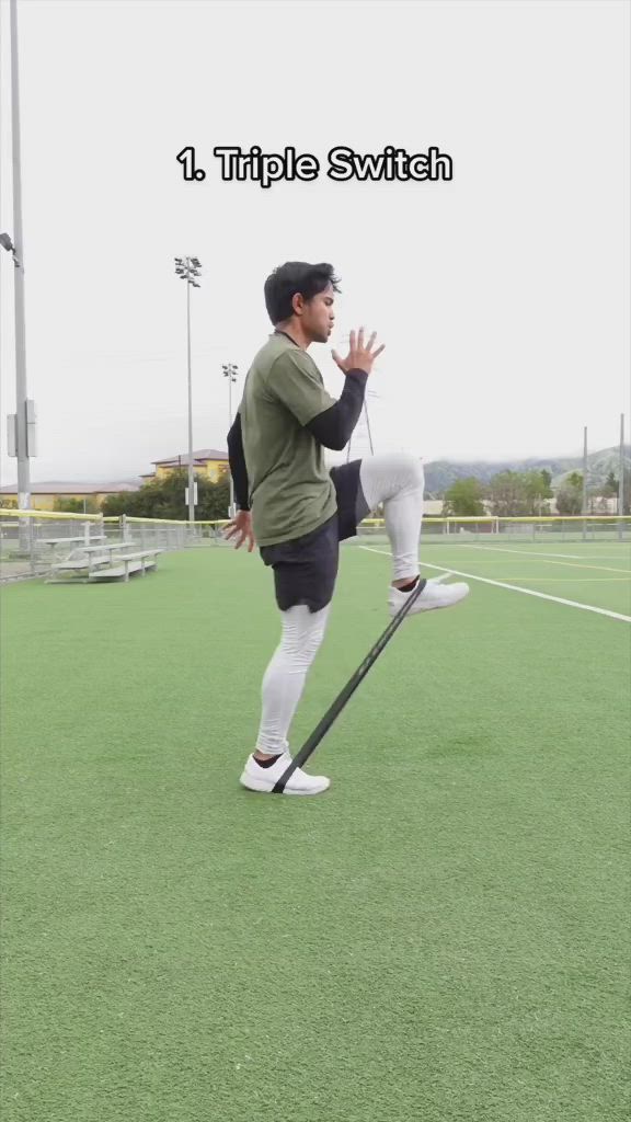 This may contain: a man standing on top of a soccer field