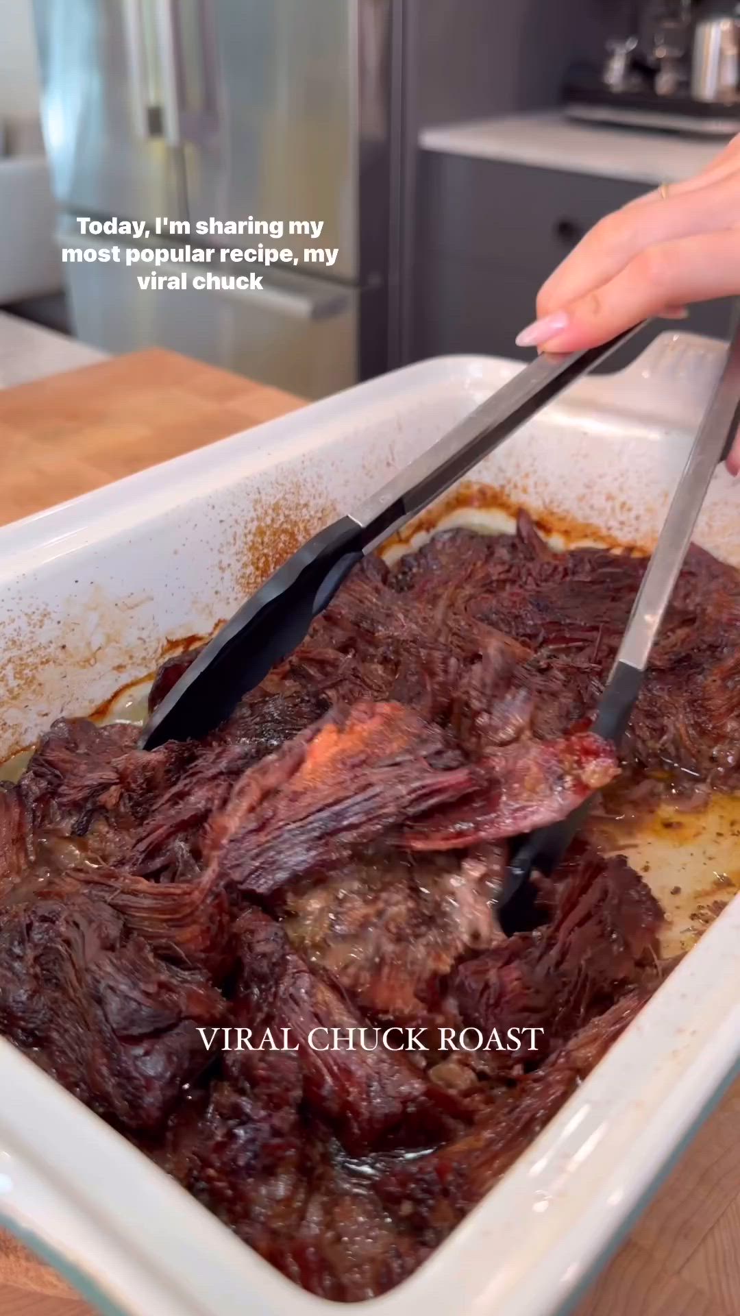 This may contain: a person is cutting up some meat in a pan